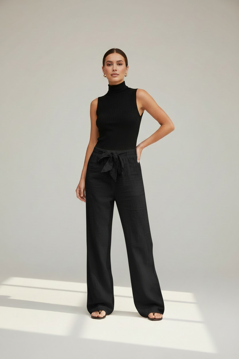 Pantalón lino negro fondo minimalista