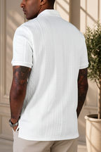 Polo blanco fondo beige - trasera